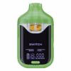 Boutiq Switch V4 2G dual-chamber vape pen displaying Hawaiian Snow and Tropical Haze cannabis oil, with digital screen and 'SWITCH' button, on a clean white background.