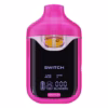 Boutiq Switch V4 2G dual-chamber vape pen displaying Lime Haze and Pink Z cannabis oil, with digital screen and 'SWITCH' button, on a clean white background.