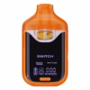 Boutiq Switch V4 2G dual-chamber vape pen displaying Peach Ringz and Zkittles cannabis oil, with digital screen and 'SWITCH' button, on a clean white background.