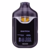 Boutiq Switch V4 2G dual-chamber vape pen displaying Pineapple Haze and Lemon Freeze cannabis oil, with digital screen and 'SWITCH' button, on a clean white background.
