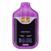 Boutiq Switch V4 2G dual-chamber vape pen displaying Purple Haze and Blinker Berry cannabis oil, with digital screen and 'SWITCH' button, on a clean white background.