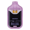 Boutiq Switch V4 2G dual-chamber vape pen displaying Strawberry Haze and Watermelon-Z cannabis oil, with digital screen and 'SWITCH' button, on a clean white background.